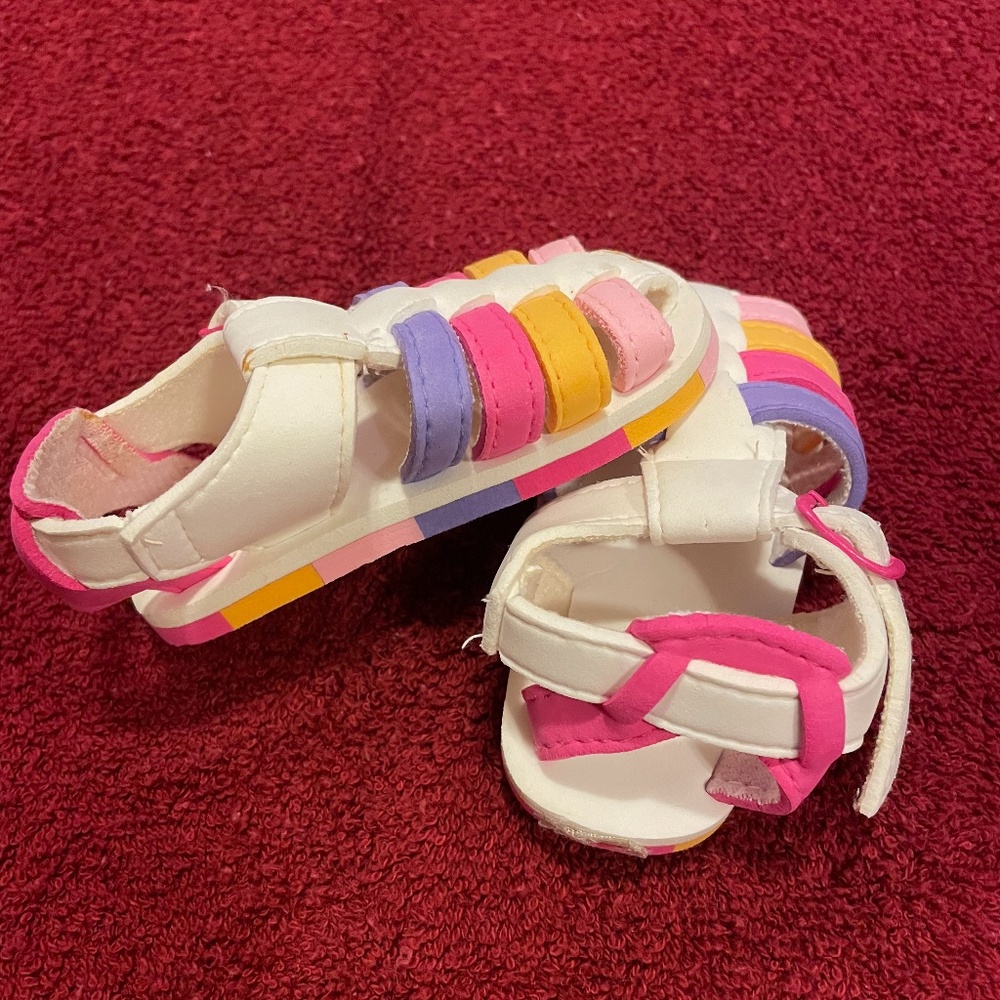 Cute, multi-colored summer shoes for toddler.